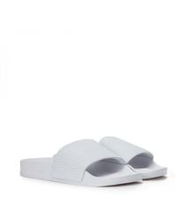 white adidas flip flops womens