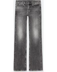 AllSaints - Zoe Low-Rise Bootcut Jeans - Lyst