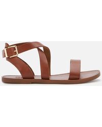 dune flat tan sandals