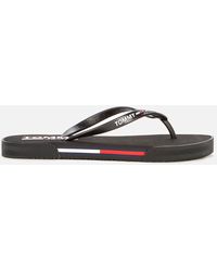 Tommy Hilfiger Flip-flops and slides for Women - Up to 54% off at Lyst.com