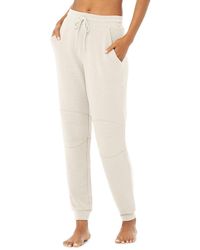 Alo Yoga Track pants and sweatpants for Women - Up to 40% off at Lyst.com