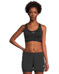 New Balance - Nb Essential Run Bra - Lyst