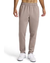 Reebok - Apparel Grind Tapered Oblong Pant - Lyst