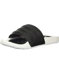 adidas Slippers for Women - Up to 39% off at Lyst.com