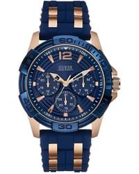 Guess - Comfortable Blue Stain Resistant Silicone + Rose Gold-tone Stainless Steel Watch With Day - Lyst