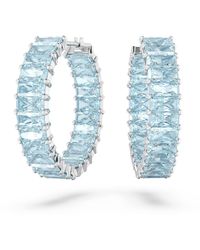 Swarovski - Matrix Hoop Earrings With Princess Cut Blue Crystals On Rhodium Finished Setting - Lyst