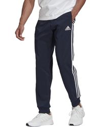 adidas - Aeroready Essentials Tapered Cuff Woven 3-stripes Pants - Lyst