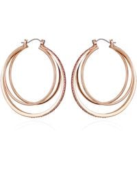 Guess - Orecchini a cerchio a triplo strato con cristallo oro rosa - Lyst