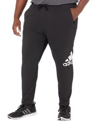 adidas - Essentials Single Jersey Tapered Badge of Sport Pants - Lyst