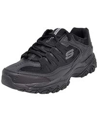skechers lace up sneakers dorados