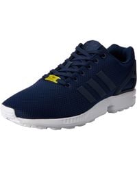 white adidas flux trainers