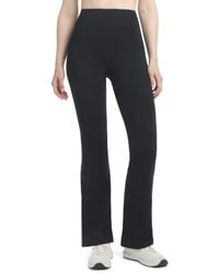Danskin - Satin Stitch Flare Leg Yoga Pants - Lyst