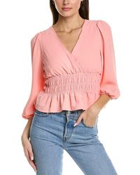 BCBGeneration - Fit And Flare Top 3/4 Puff Sleeve Smocked Waist Surplice Neck Shirt - Lyst