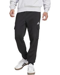 adidas - Essentials Feel Cozy Fleece Cargo Pants - Lyst