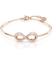Swarovski - Hyperbola Bangle Bracelet - Lyst