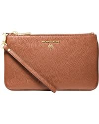 Michael Kors - Jet Set Charm Medium Top-zip Wristlet - Lyst