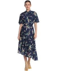 Maggy London - Floral Printed Flutter Sleeve Midi Dress With Twist Mock Neck And Asymmetrical Hem - Lyst