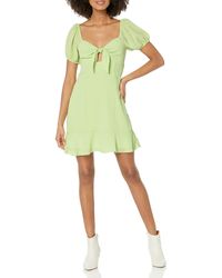 BCBGeneration - Fit And Flare Short Sleeve Knot Front Smocked Mini Dress With Ruffle Hem - Lyst