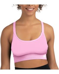 New Balance - Racerback Seamless Mid Impact Sport Bra With Adjustable Straps And Removable Pads - Lyst