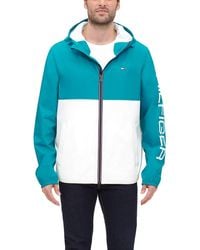 Tommy Hilfiger - Colorblock Hooded Rain Jacket In Teal At Nordstrom Rack - Lyst