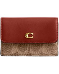 COACH - Coated Canvas Signature Essential Mini Trifold Wallet - Lyst