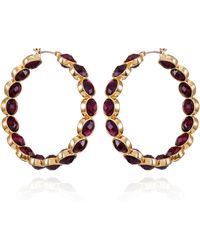 Guess - Orecchini a cerchio in cristallo rosso chiaro in tono dorato - Lyst