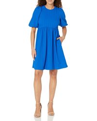 Maggy London - Puff Short Sleeve Seersucker Dress With Curved Empire Waist And Shirred Above The Knee Skirt - Lyst