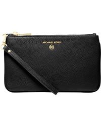 Michael Kors - Jet Set Charm Medium Top-zip Wristlet - Lyst