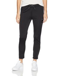 adidas originals three stripe cigarette pants in orange