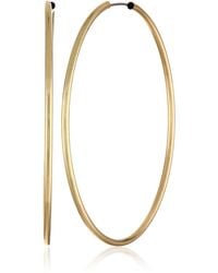 Guess - "basic" Gold Large Endless Hoop Earrings - Lyst