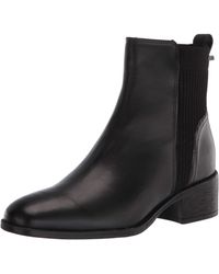 Kenneth Cole Reaction Denim Salt Biker Jewel Buckle Chelsea Booties in Black - Lyst
