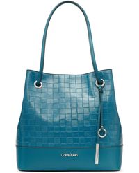Calvin Klein Leather Gabrianna Novelty North/south Key Item Tote in Blue -  Save 44% | Lyst