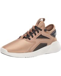 Reebok Freestyle Motion Lo Dance Shoe in Natural | Lyst