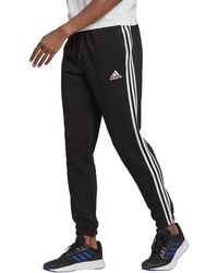 adidas - Standard Essentials Fleece Tapered Elastic Cuff 3-Stripes Pants - Lyst