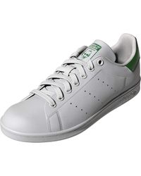 adidas originals stan smith sneakers with reptile back counter
