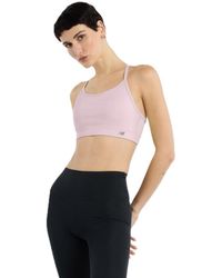 New Balance - Nb Essential Yoga Bra - Lyst