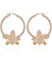 Guess - Orecchini a cerchio in cristallo dorato con motivo floreale - Lyst