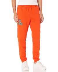 red lacoste sweatpants