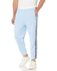 Lacoste - Relaxed Fit Adjustable Waist Sweatpants W Tennis Word Taping Down The Legs - Lyst