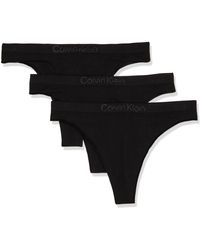 Calvin Klein - Bonded Flex Seamless 3-pack Mid Rise Thong Black/black/black - Lyst