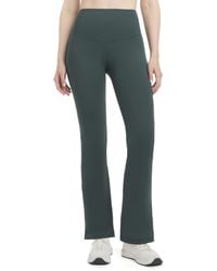 Danskin - Satin Stitch Flare Leg Yoga Pants - Lyst