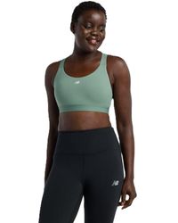 New Balance - Nb Essential Train Bra - Lyst