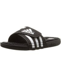 adidas Slippers for Women - Up to 29% off at Lyst.com