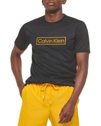 Calvin Klein - Ica Corta Leggera ad Asciugatura Rapida 40+ Protezione UPF Maglietta Rash Guard - Lyst