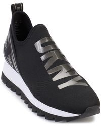 DKNY - Abbi Knit Slip On Sneaker With Logo - Lyst