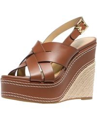 MICHAEL Michael Kors - Sandalo da donna con zeppa Nora - Lyst