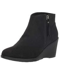 Skechers Wedge boots for Women - Up to 