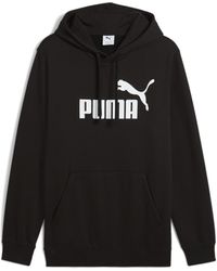 PUMA - Size Essentials Logo Fleece Hoodie - Lyst