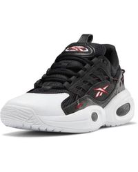 reebok solution mid black
