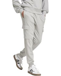 adidas - Essentials Feel Cozy Fleece Cargo Pants - Lyst